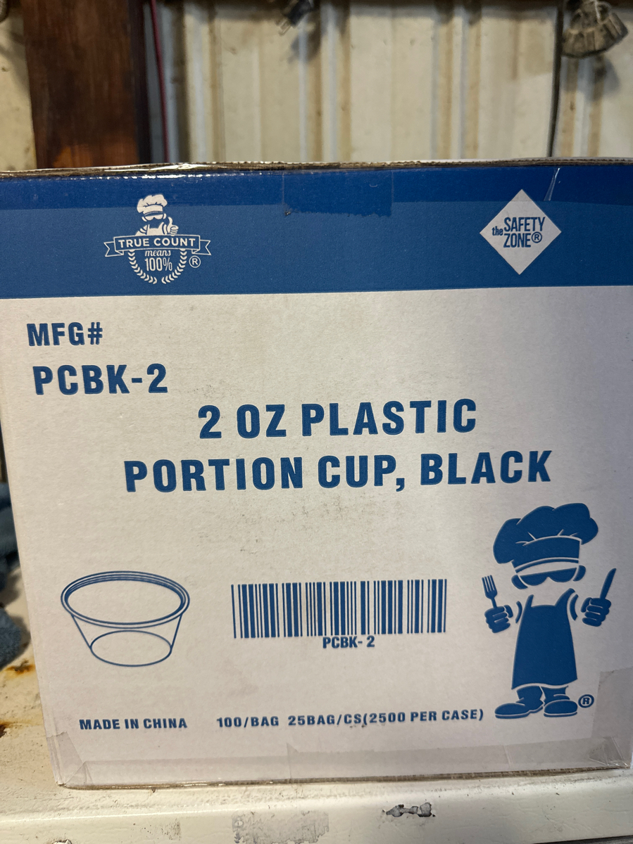 2 oz plastic portion cups, black - Image 1